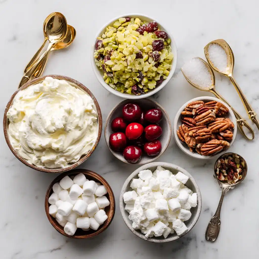 ingredients for pistachio fluff recipe laid out on marble
