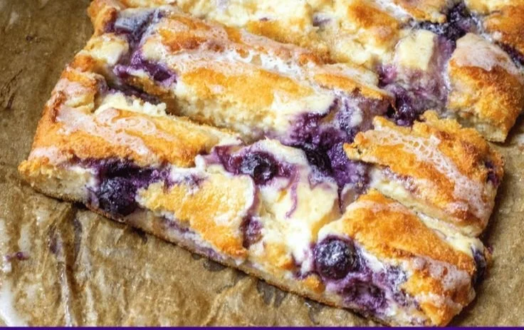Braided blueberry cream cheese danish with a golden crust and vibrant filling