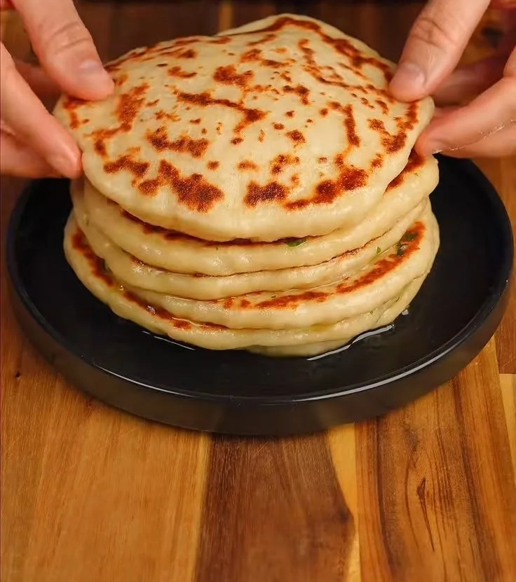 High Protein Cheesy Garlic Naans served with dipping sauce