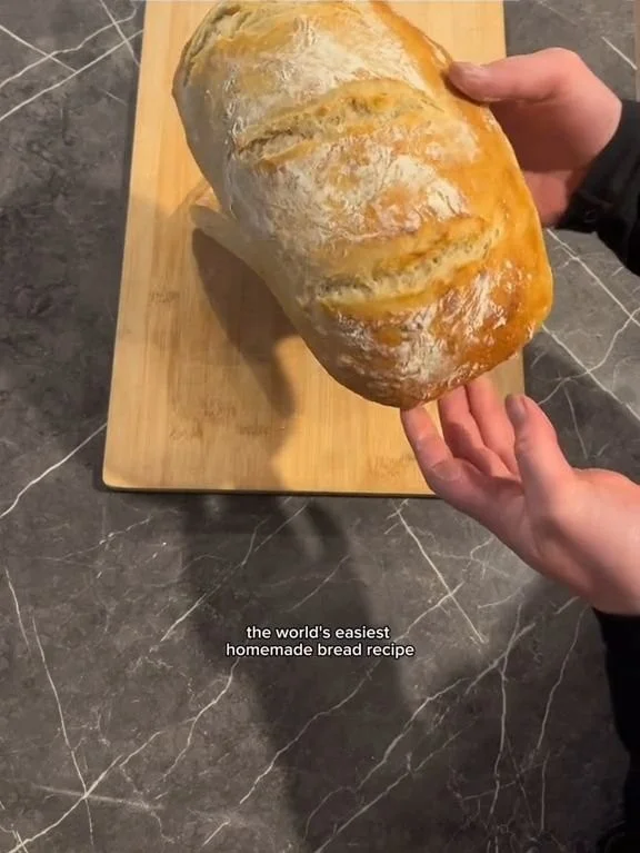 Freshly baked homemade bread on a wooden table